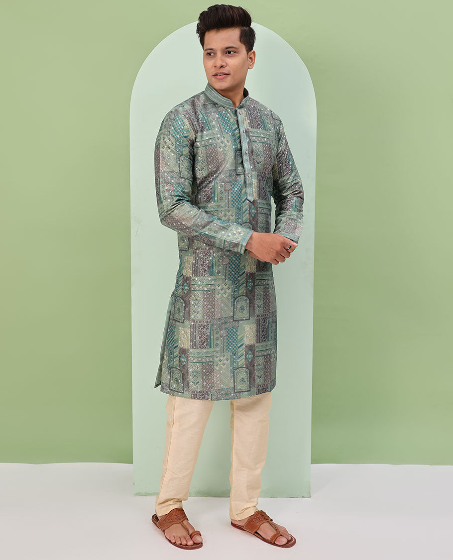Green base, colorful Mughal-style floral and geometric motifs printed with glitter work, full-sleeved readymade kurta