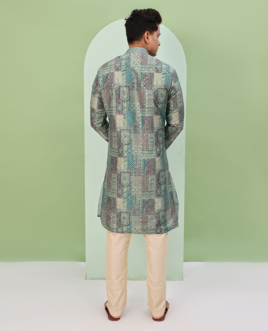 Green base, colorful Mughal-style floral and geometric motifs printed with glitter work, full-sleeved readymade kurta