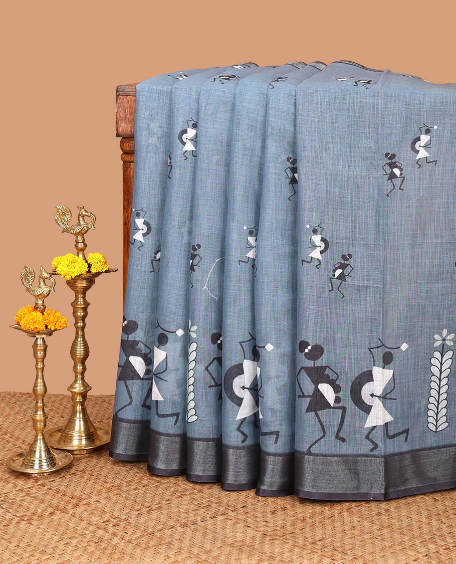 Grey warli printed linen saree with zari warli printed border & printed pallu along with butta design blouse