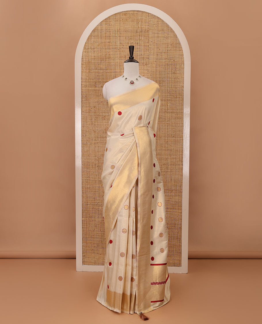 Cream small red polka dots banarasi tissue saree, zari border, pallu of red polka dots & running plain blouse