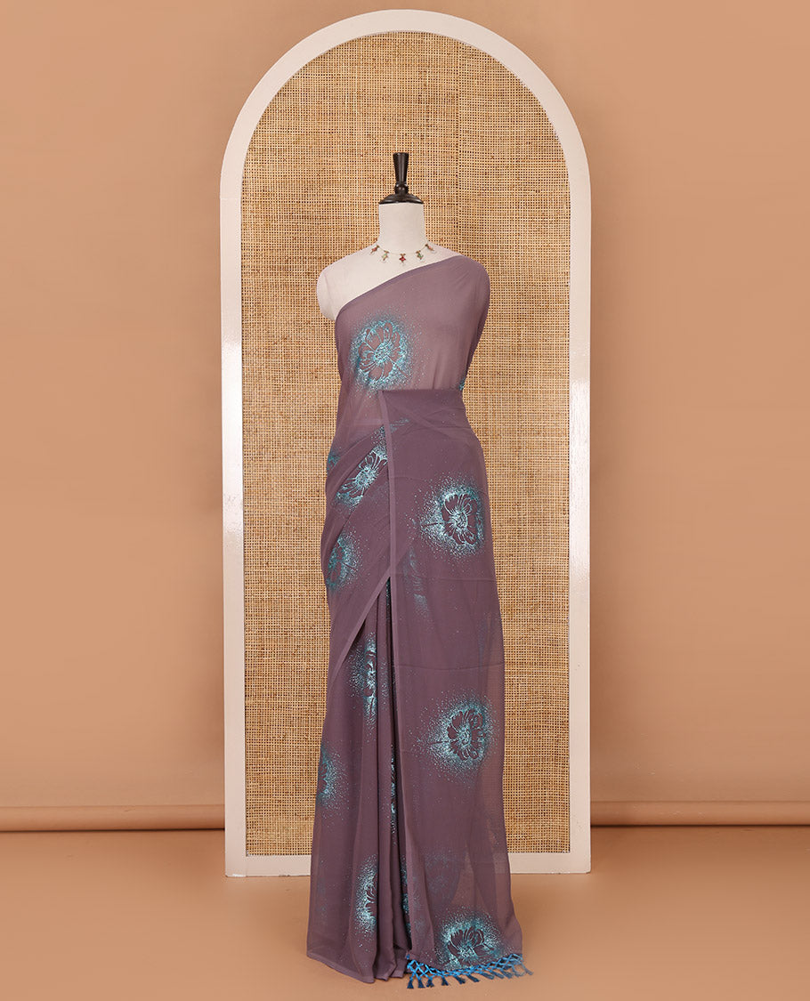Borderless pastel lilac 60 gm georgette saree features floral vine designs, glitter embroidery work, contrast plain blouse
