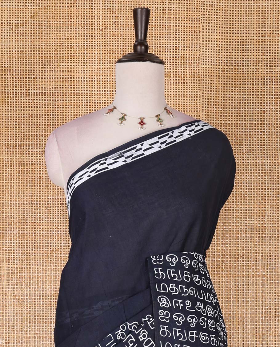 Borderless black Tamil letters printed Sungudi cotton saree with contrast Tamil letters printed blouse