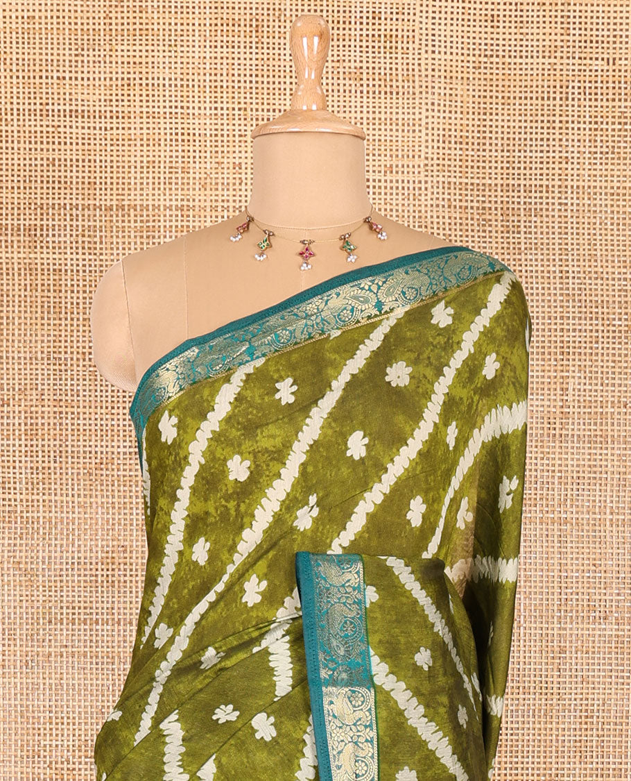 Green batik style lehariya stripes printed muslin silk saree, contrast peacock zari woven border, Mughal inspired painting style motifs printed pallu and a contrast blouse