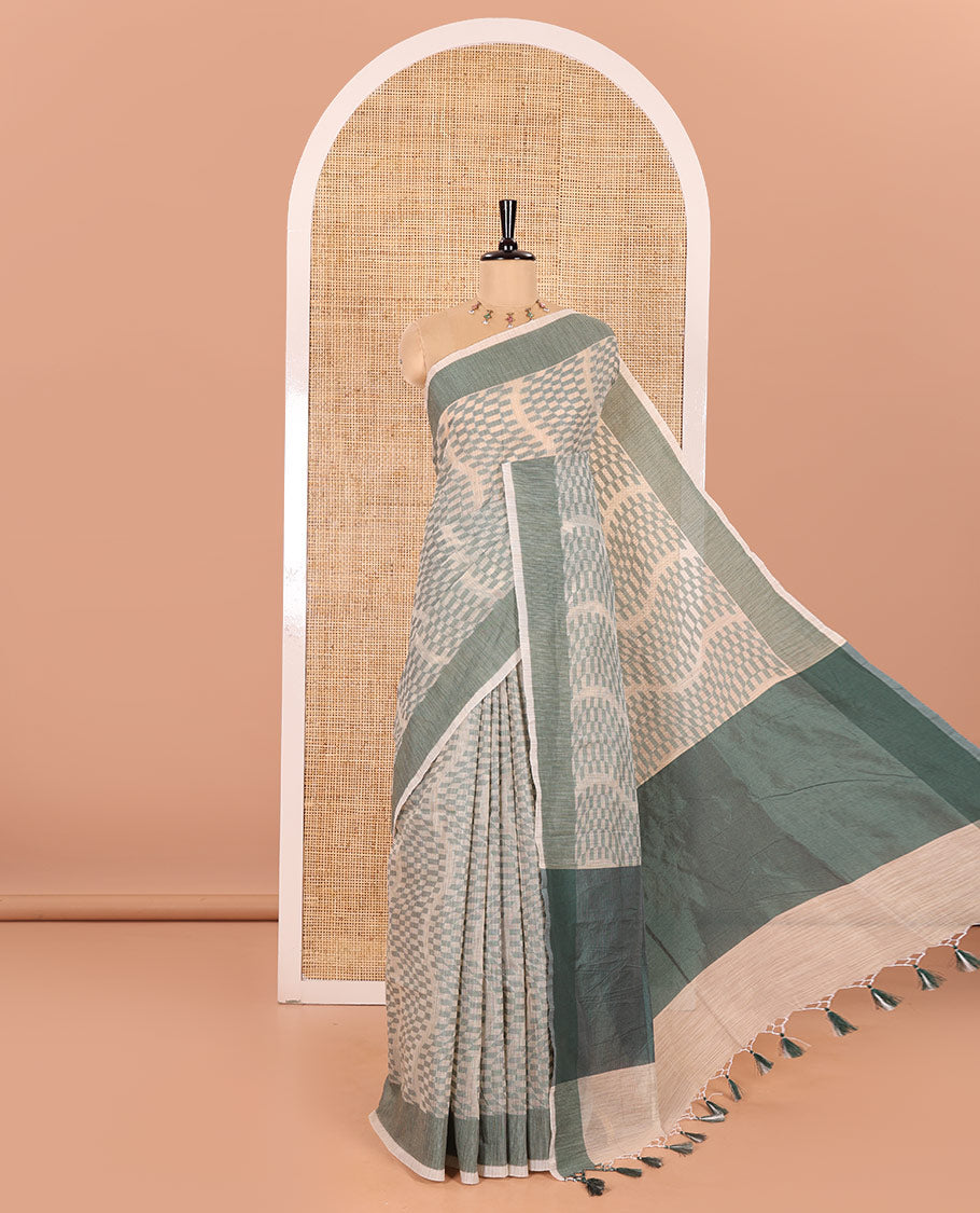 Chikku and Green Kota Cotton Saree Subtly Woven with Zig-Zag Checks in Thread, Subtly Sparkled Contrast Bavanji Border, Plain Pallu, and Paired with a Matching Blouse