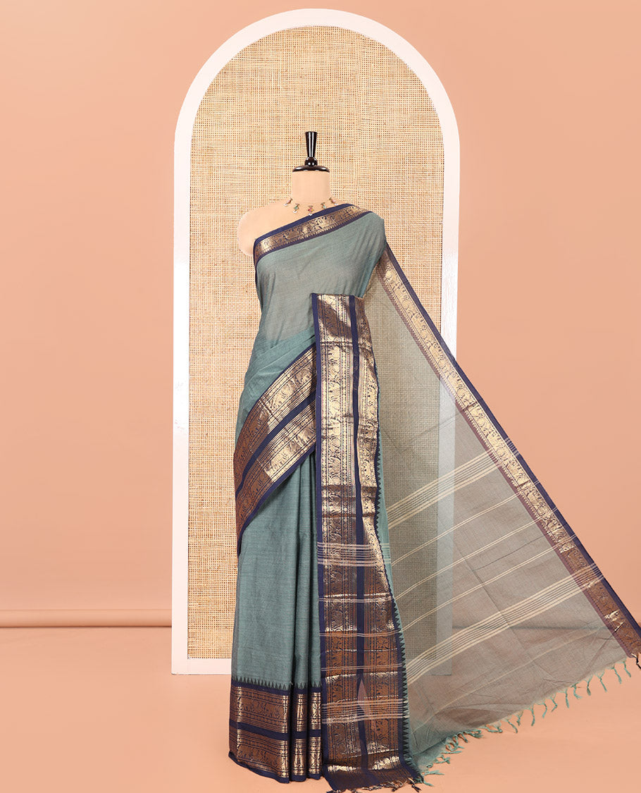 Green Plain Chettinad Cotton Saree, Complemented by a Contrast Traditional Zari Border of Peacock and Elephant Designs, Subtly Striped Pallu, and Paired with a Matching Blouse