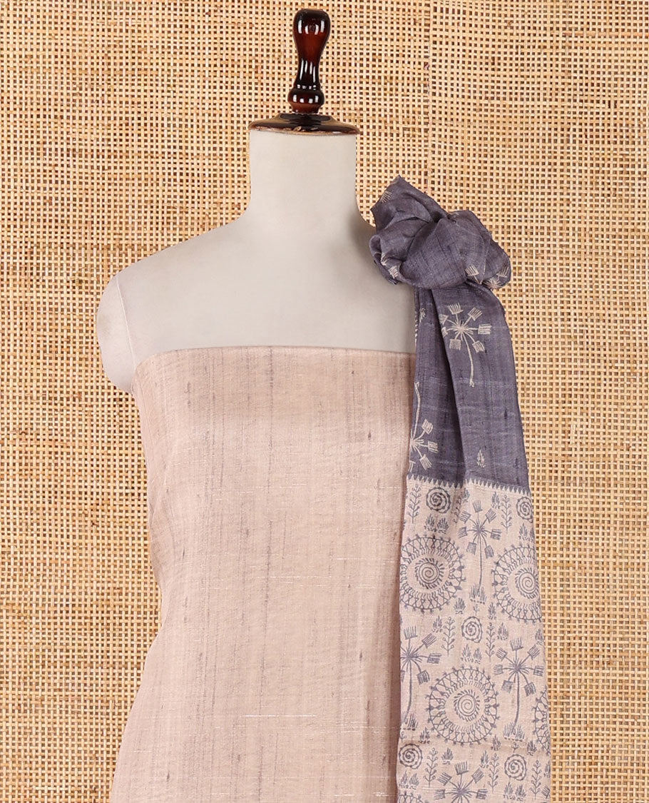 Chikku color semi-tussar material chudidar set, warli motifs top, contrast grey plain bottom & dupatta steeped with warli motifs