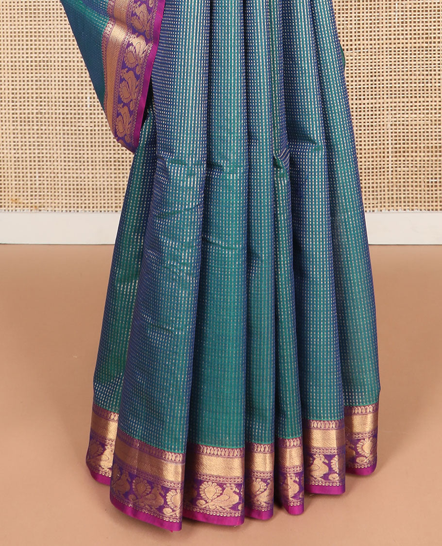 Sea blue striped silk cotton saree with contrast peacock design border & peacock design pallu