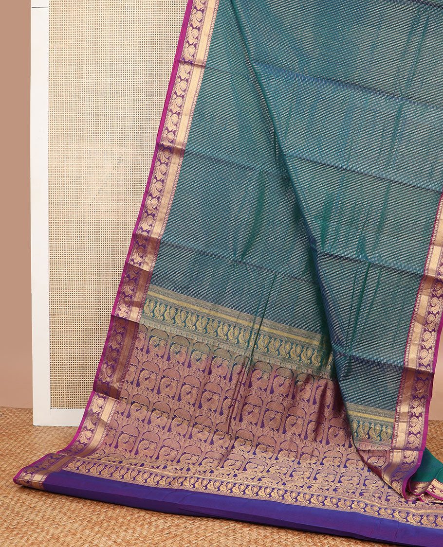 Sea blue striped silk cotton saree with contrast peacock design border & peacock design pallu