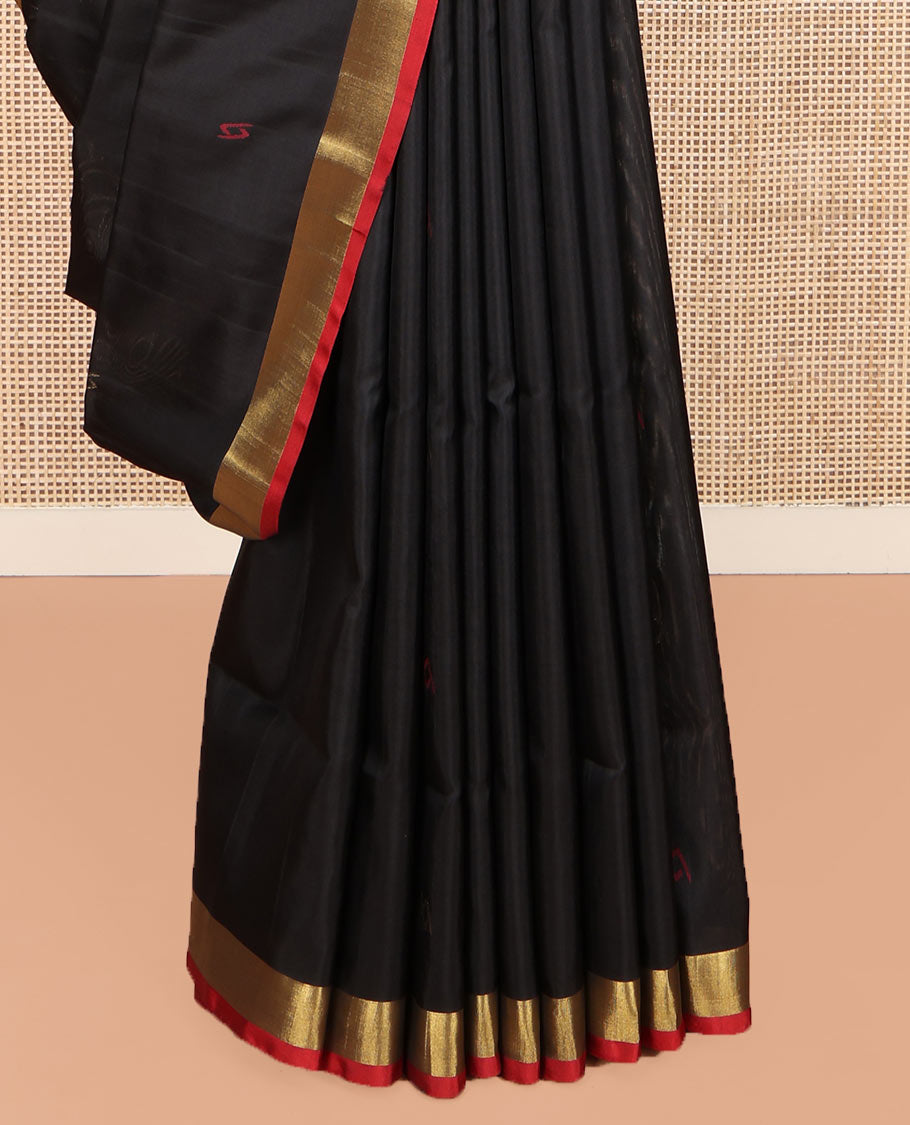 Black Uppada Silk Saree, Adorned with Buttas All Over Its Body, Complemented by a Contrast Bavanji Border, Pallu of Unique Designs, and Paired with a Matching Blouse