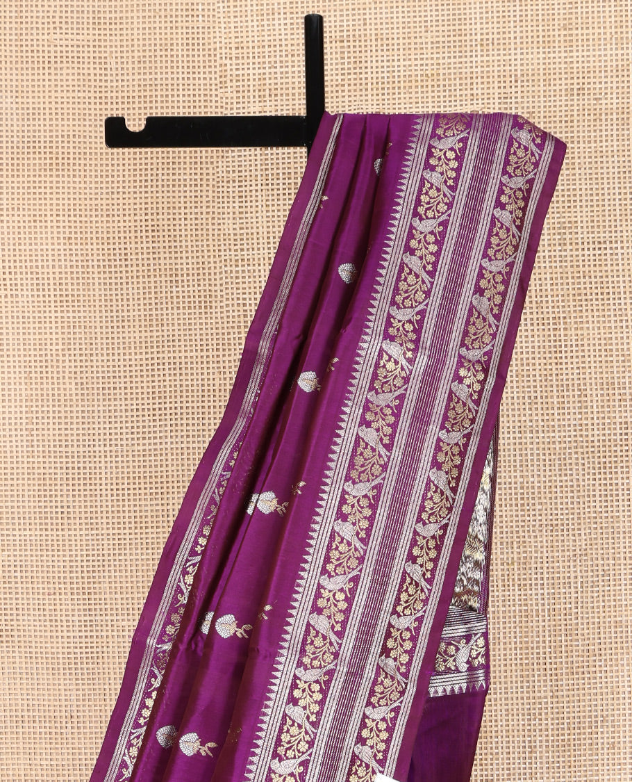 Purple Venkatagiri Silk Saree, Decorated with Zari Buttas on Its Body, Highlighted by a Traditional Zari Border of Floral-Sparrow Designs, Pallu Steeped with Traditional Designs, and Paired with a Matching Blouse