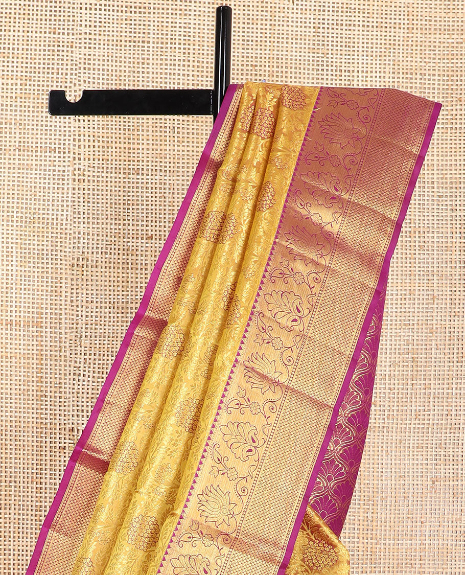 Mustard floral jacqaurd kancheepuram silk saree with contrast border of rekku, muthu, kuyil kann design & zari design pallu
