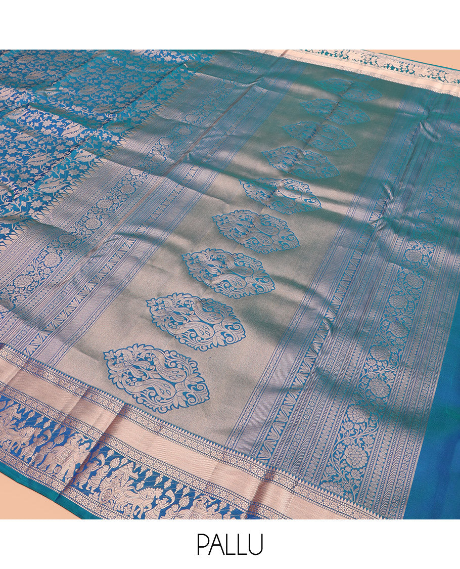 Blue Kanchipuram Silk Saree Elegantly Framed with Jacquard Design, Highlighted by Zari Border of Rekku, Muthu, Kamalam, and Prince in Palanquin Designs, Beautifully Bedecked Pallu, and Paired with a Matching Blouse