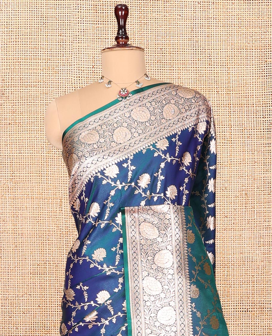 Peacock Blue Banarasi Nylon Saree, Uniquely Detailed with Jacquard, a Floral Creeper Zari Border, Intricate Pallu, and a Matching Blouse