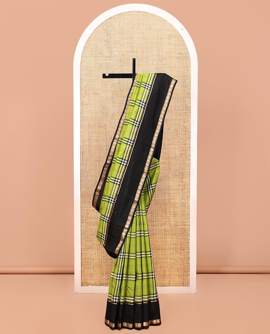Green-Black Vasundhara Lite Silkmix Saree Features Checks, Contrast Rettai Pettu Rekku-Poun Border, Zari-Striped Pallu, and a Contrast Blouse