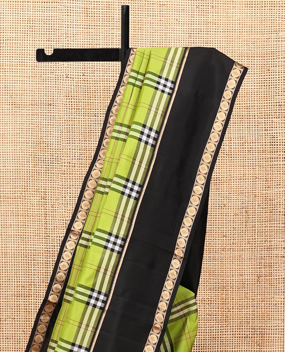 Green-Black Vasundhara Lite Silkmix Saree Features Checks, Contrast Rettai Pettu Rekku-Poun Border, Zari-Striped Pallu, and a Contrast Blouse