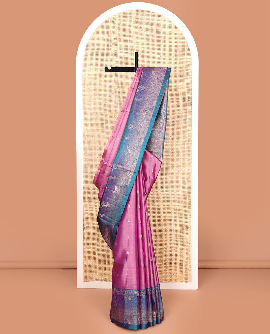 Pink zari buttas soft silk saree, contrast pond-theme zari woven border of floral and swan motifs, and intricate pallu