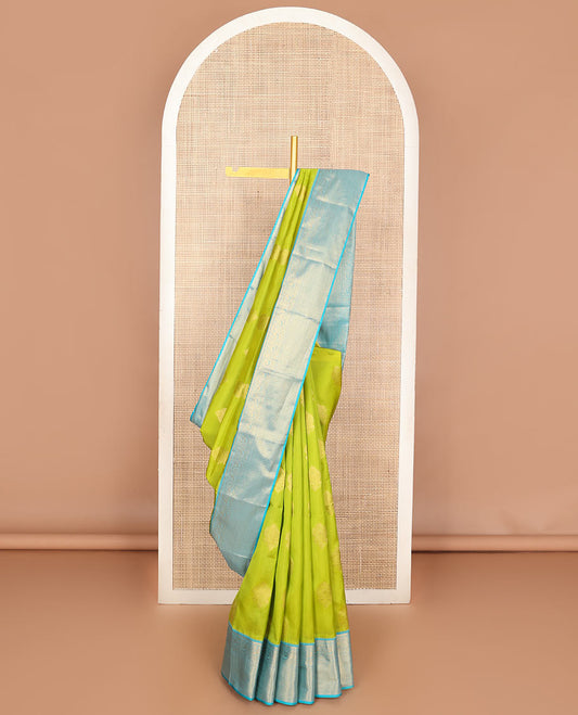 Green zari buttas Vasundhara silk mix saree, contrast traditional zari border & pallu features diagonal kodi visiry designs