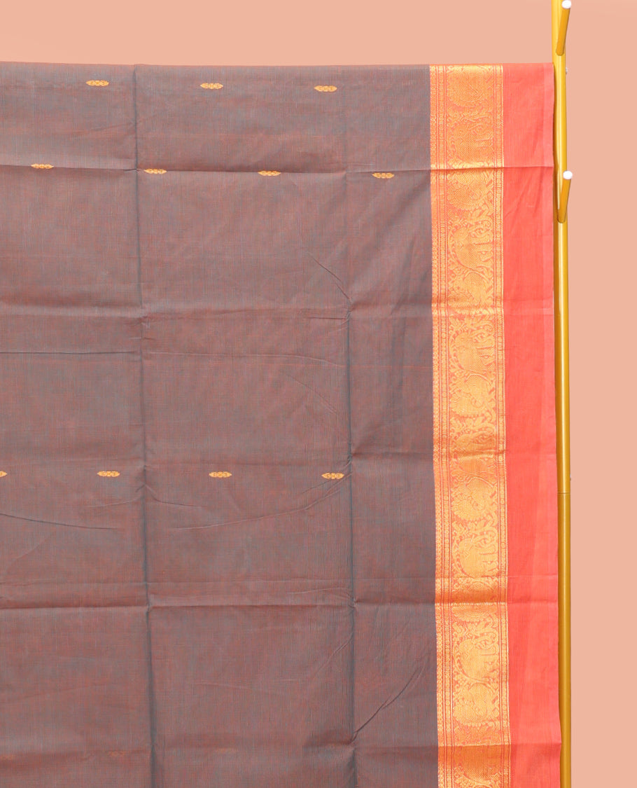 Grey Chettinad Cotton Saree, Embellished with Thread Buttas All Over Its Body, Complemented by a Contrast Kal Eragina Border of Kodi Peacock and Elephant Designs, Pallu of Buttas and Stripes, and Paired with a Matching Blouse