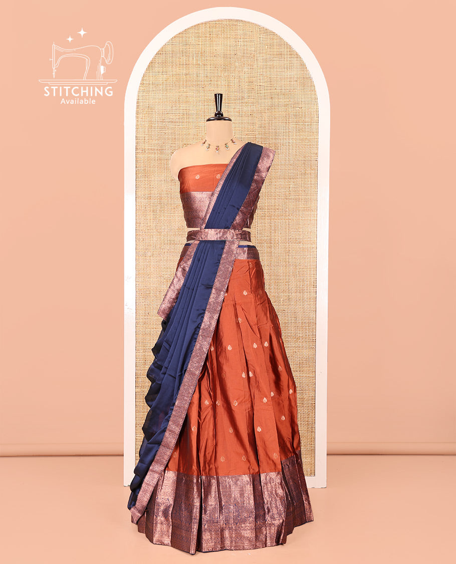 Rust-Blue Semi-Banarasi Half-Saree Features Zari Buttas Skirt, a Contrast Traditional Zari Border, a Matching Blouse, and a Contrast Satin Georgette Dhavani