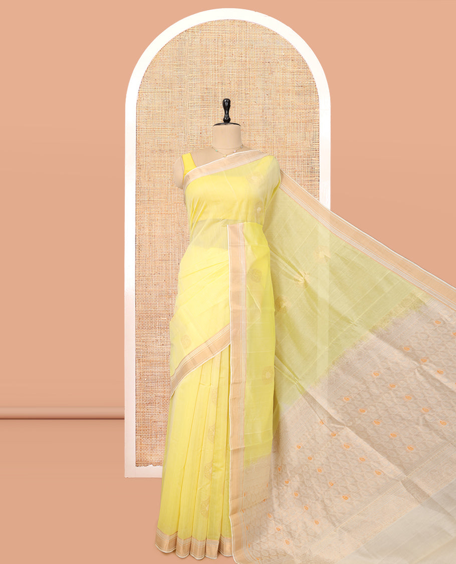 Yellow Silk Cotton Saree, Sparsely Woven with Buttas, a Contrast Zari Border, Intricately Designed Pallu, and a Contrast Blouse