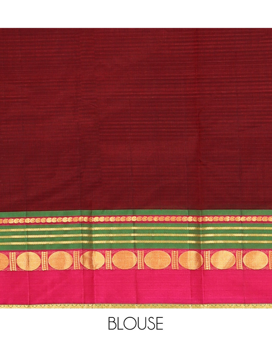 Blue Kanchipuram Silk Saree, Subtly Sparkled with Stripes All Over Its Body, Complemented by a Contrast Border of Manga, Banaras, Poun, and Rettai Neli Designs, Pallu of Zari Stripes, and Paired with a Contrast Blouse