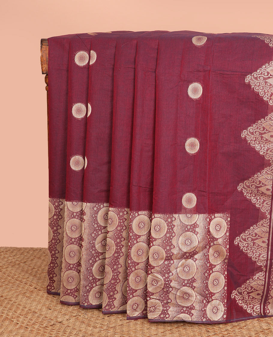 Maroon Coimbatore Cotton Saree, Beautified with Circle Buttas All Over Its Body, Subtly Made Border Steeped with Circle Designs, Pallu Mirrors the Same Body Design, and Paired with a Matching Blouse