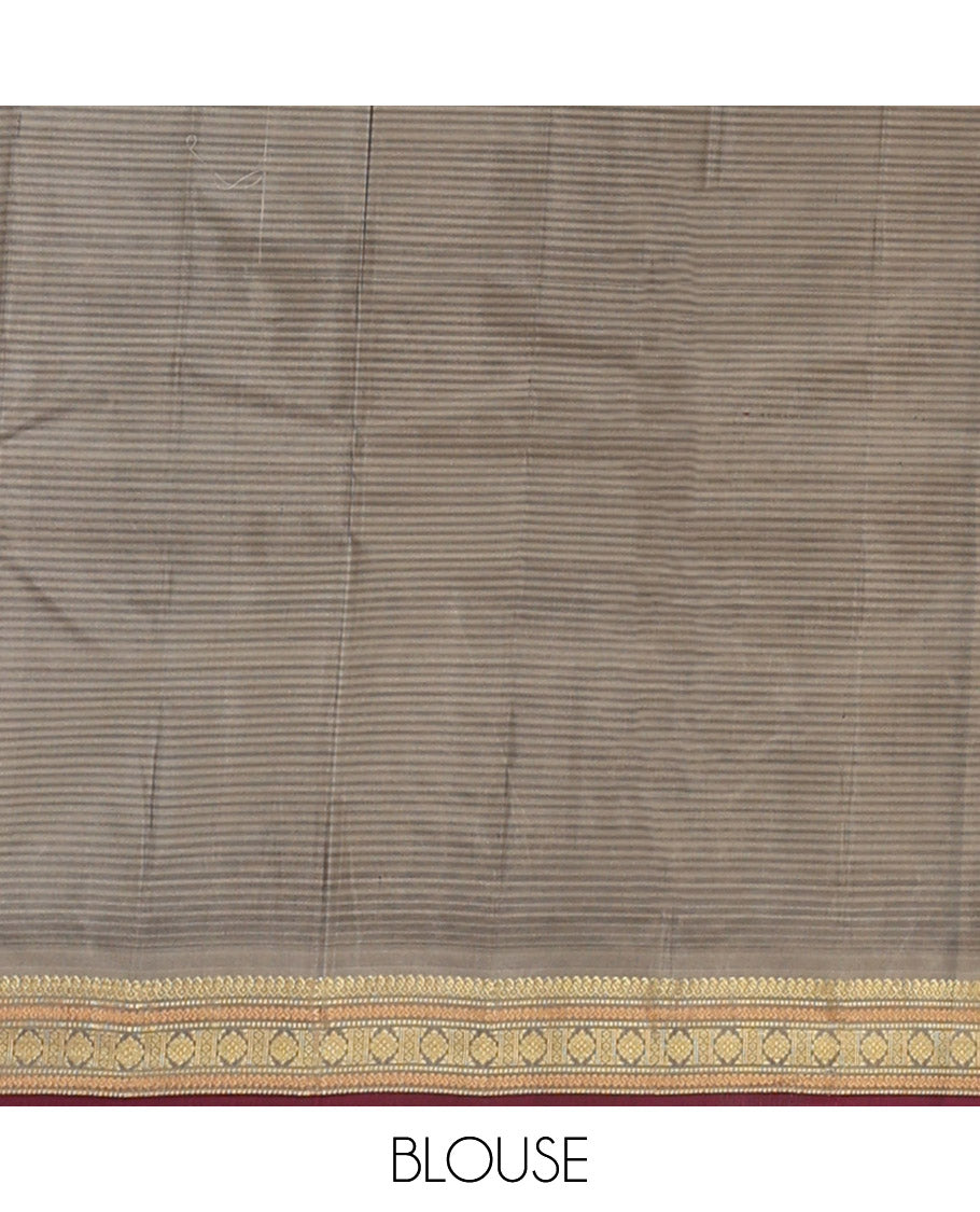 Maroon Kanchipuram Silk Saree Beautified with Vazhaipoo Stripes and Zari Buttas, Complemented by Contrast Border Featuring Manga Mokku, Muthu, Greek Key, and Laddu Kamalam Designs, Sparsely Zari Woven Pallu, and Paired with a Contrast Blouse