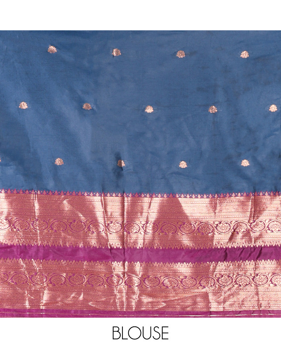 Blue and Purple Semi-Banarasi Half-Saree Featuring Zari Buttas Skirt, Complemented by Contrast Rettai Pettu, Traditional Border of Floral Creeper Designs, Paired with a Matching Blouse, and a Satin Georgette Embroidered Scallop Dhavani