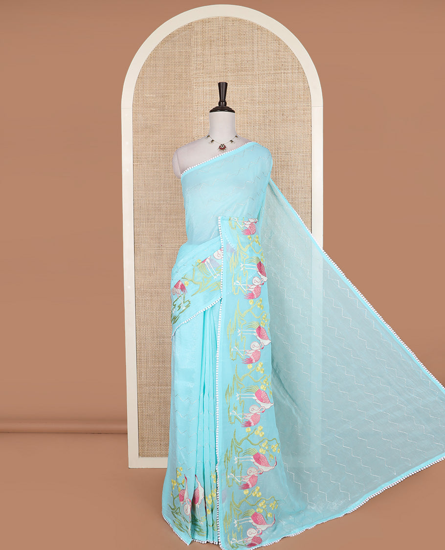 Blue chevron striped and flamingo motifs designer saree, pom-pom lace border, and chevron striped pallu