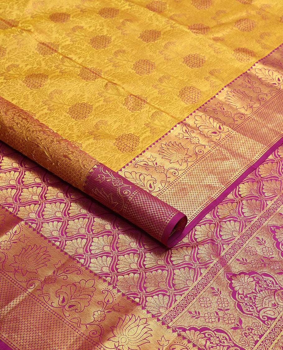 Mustard floral jacqaurd kancheepuram silk saree with contrast border of rekku, muthu, kuyil kann design & zari design pallu