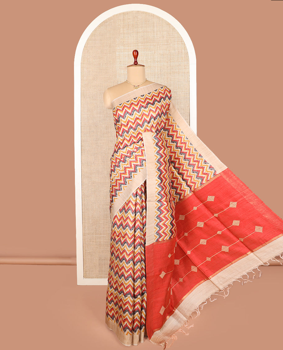 Multi-color chevron design printed tussar saree, contrast border, and pallu of stripes and diamond designs