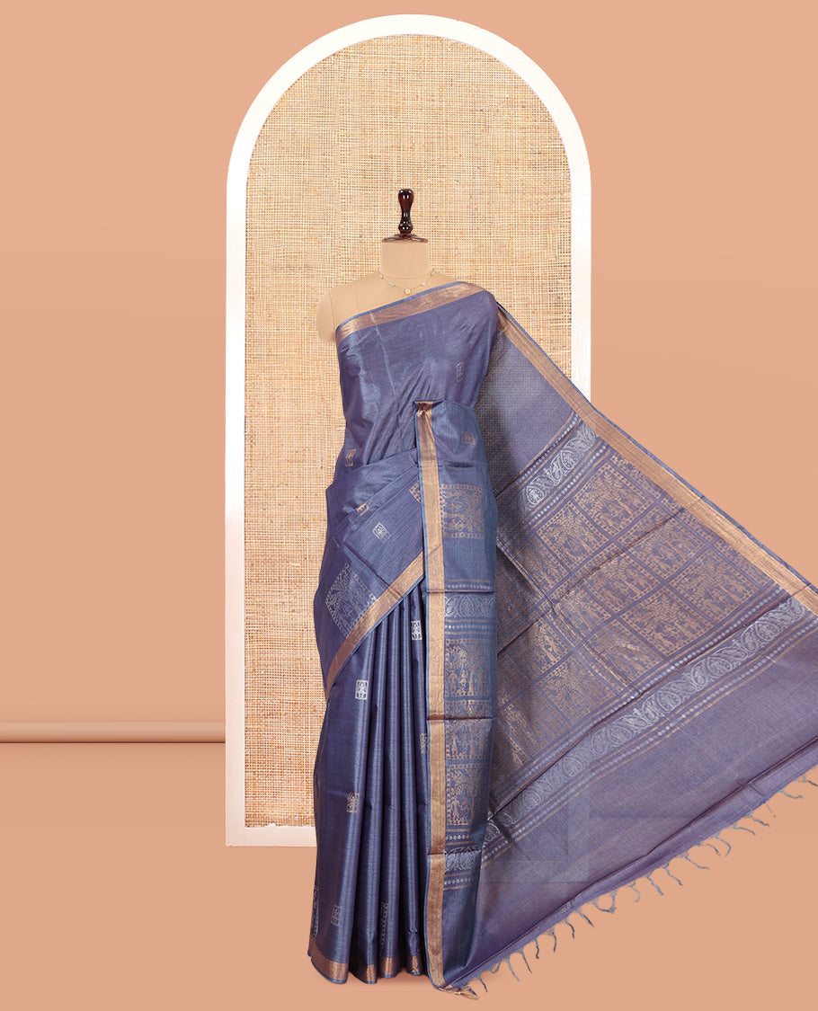 Grey Tussar Saree, Enriched with Warli Buttas, a Subtle Zari Border, Pallu of Warli Designs, and a Matching Blouse