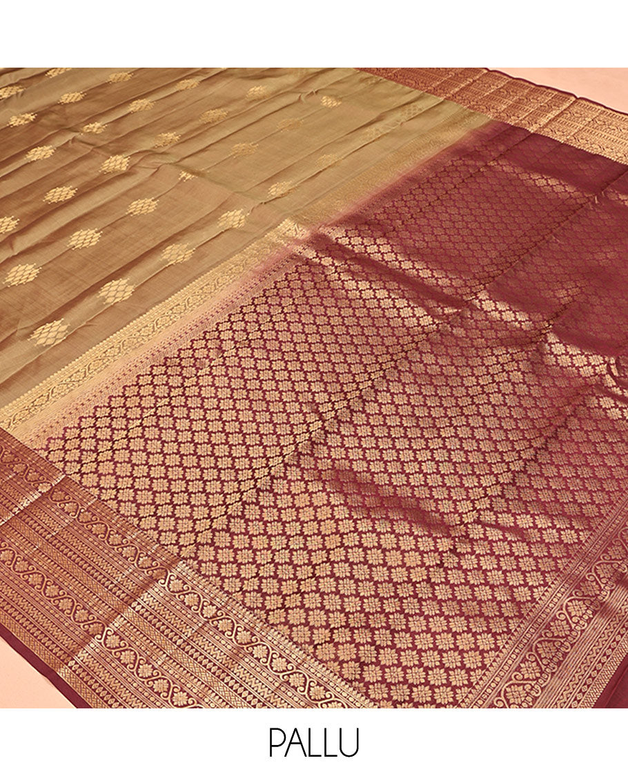 Light Brown Vasundhara Lite Silk Mix Saree, Ornamented With Zari Buttas All Over Its Body, Complemented by Contrast Border of Thilakam Mokku, Kodi Visiry, Neli, Diamond, and Paiyadi Kattam, Grand Pallu and Paired with a Contrast Blouse