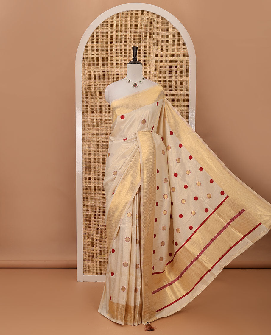 Cream small red polka dots banarasi tissue saree, zari border, pallu of red polka dots & running plain blouse
