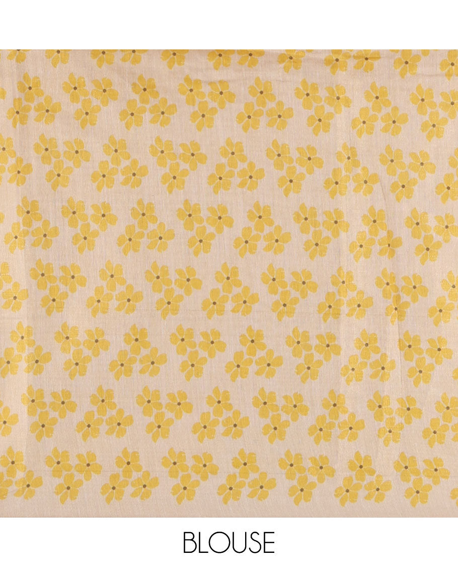 Borderless cream printed onam tissue silk saree features yellow color five-petal flower & leaf motifs print, matching floral print blouse