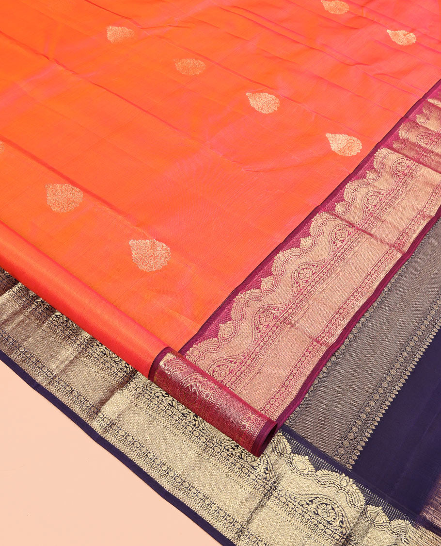 Orange Vasundhara Silk Saree Featuring Zari Buttas, Contrast Traditional Zari Border, Pallu Steeped with Paisleys, and Contrast Blouse
