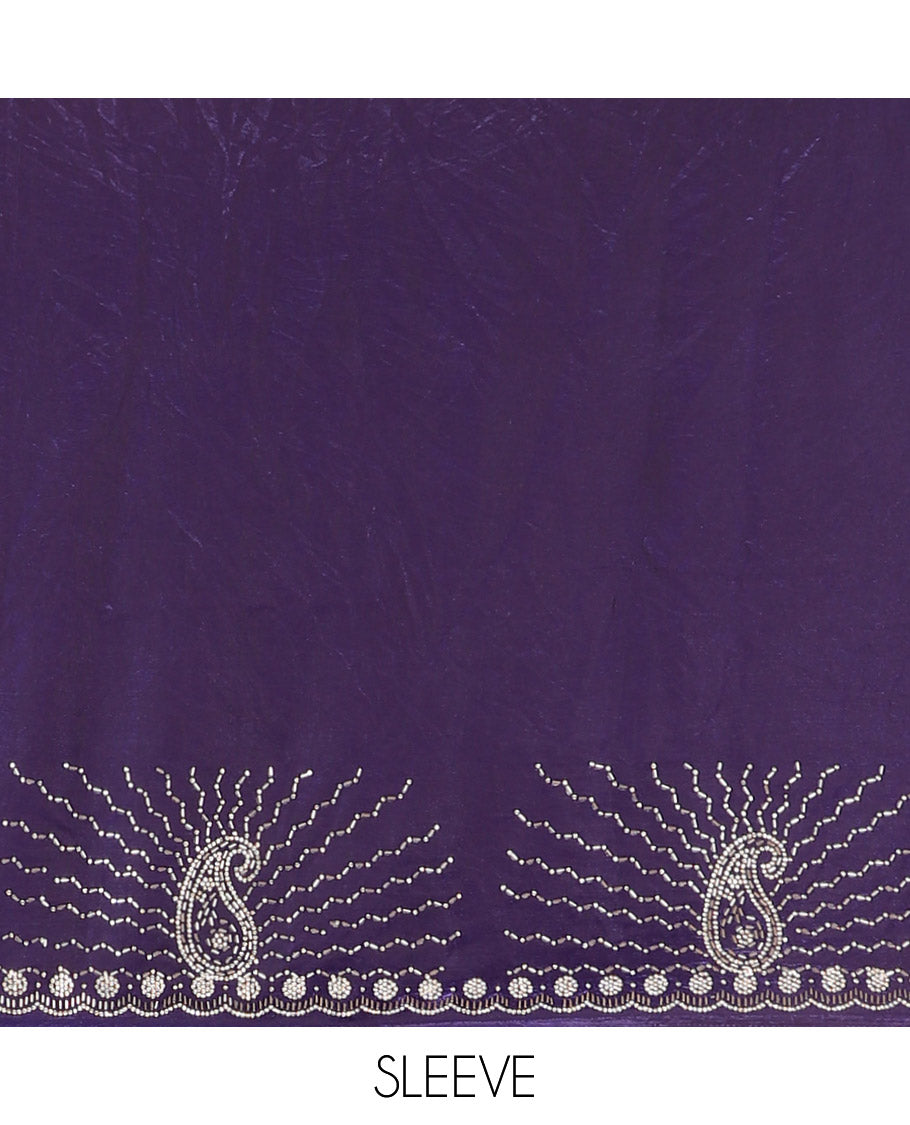 Violet micro-stone work fendy chiffon saree with paisley stone work on its shoulder, a scallop stone work border, a butterfly style pallu, and a matching stone work blouse