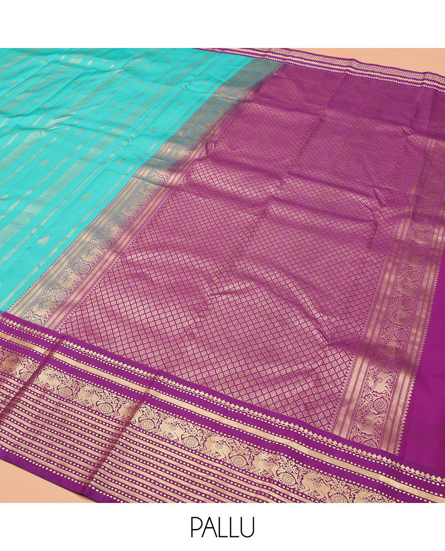 Blue Vasundhara Silk Saree, Embellished with Zari Designs All Over Its Body, Complemented by a Contrast Korvai Border of Thilakam Mokku, Muthu, and Yaali Designs, Grand Jaal Pallu, and Paired with a Contrast Blouse