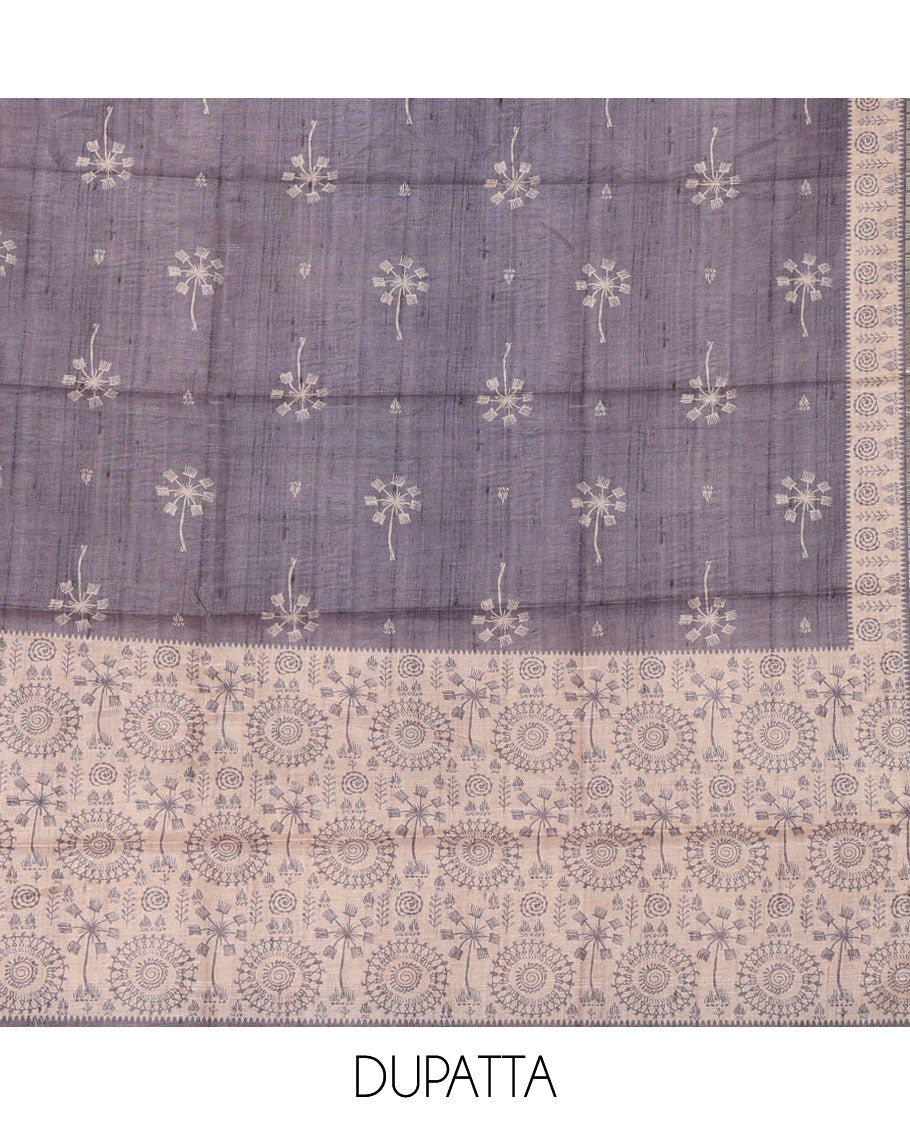 Chikku color semi-tussar material chudidar set, warli motifs top, contrast grey plain bottom & dupatta steeped with warli motifs
