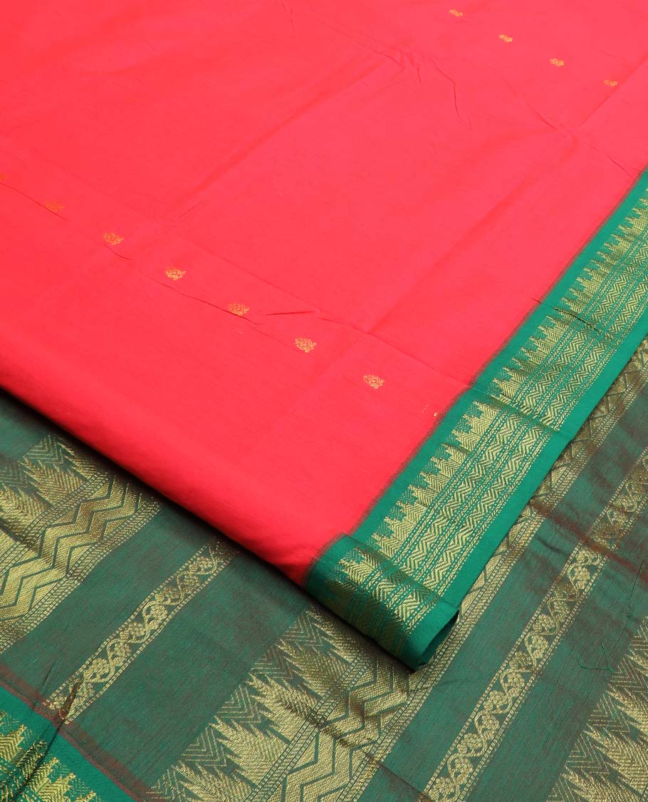 Red buttas nine-yard cotton saree, contrast zari border, and pallu steeped with traditional motifs