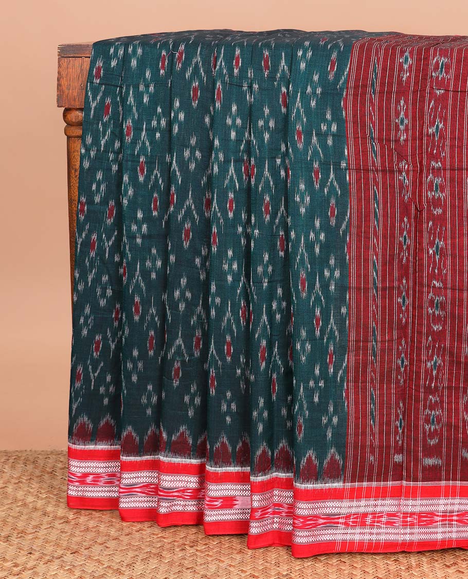 Blue buttas ikkat cotton saree, contrast ikkat border, and pallu of floral ikkat designs