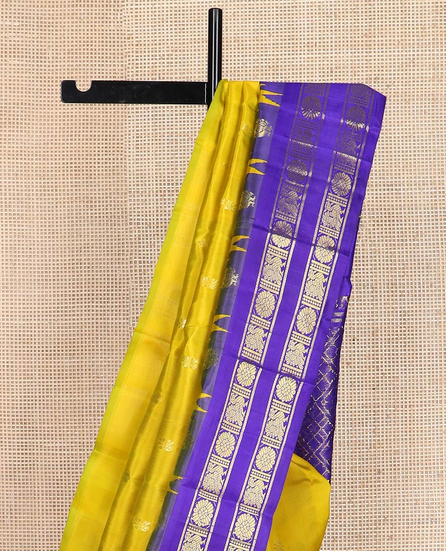 Yellow zari buttas kanchipuram silk saree, contrast rettai pettu one-sided annam chakram border & jaal design pallu