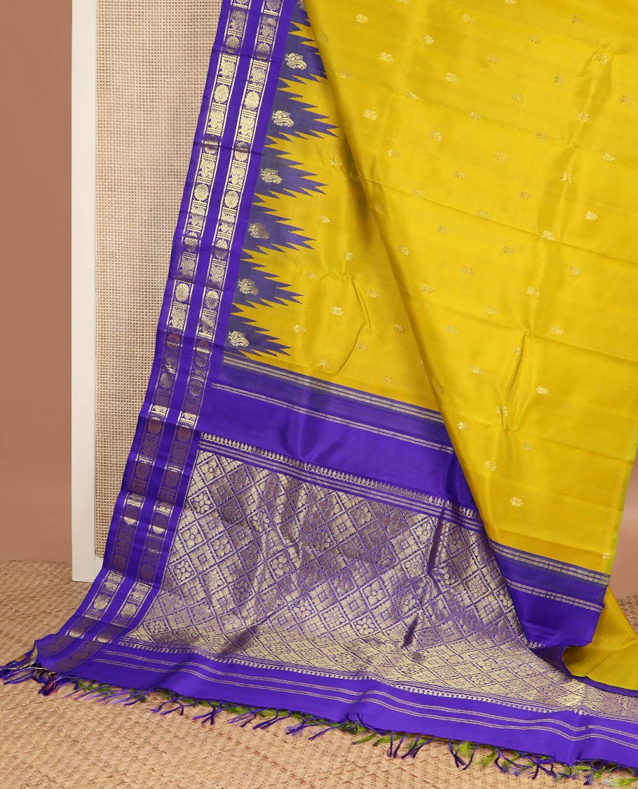 Yellow zari buttas kanchipuram silk saree, contrast rettai pettu one-sided annam chakram border & jaal design pallu