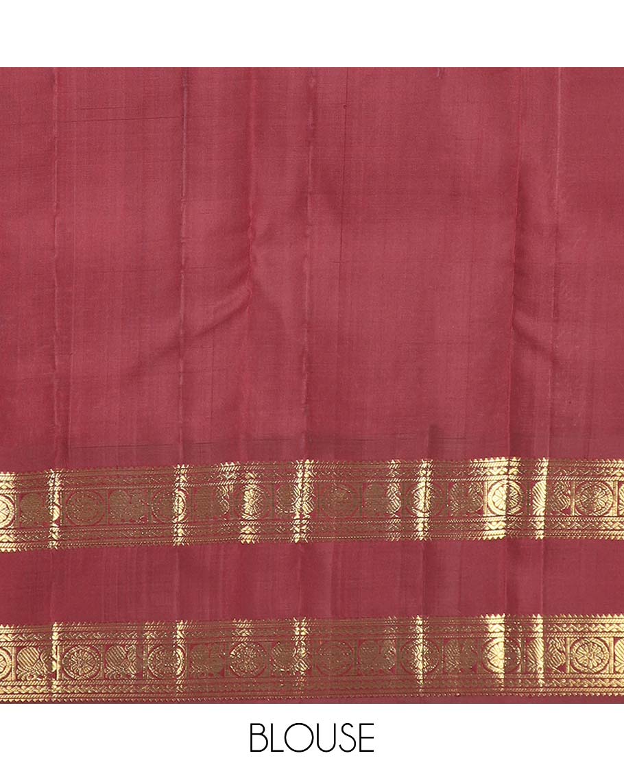 Orange zari checked Kanchipuram silk saree, contrast rettai pettu border of rekku, banaras, neli, and mayil chakram designs, and pallu of lavangam designs