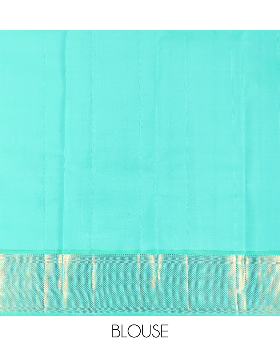 Yellow plain Kanchipuram silk saree, contrast border of salngai, muthu, and ara maadam designs, and intricate pallu