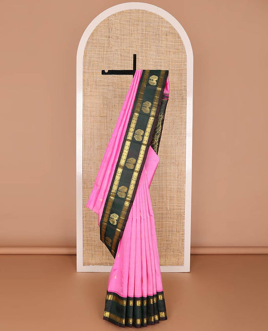 Pink zari buttas kancheepuram silk saree, contrast one-sided rettai pettu korvai border of banaras & poun designs & pallu of manga & floral designs