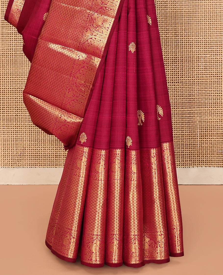 Purple Kanchipuram Silk Saree, Meticulously Crafted with Zari Buttas All Over Its Body, Highlighted by a Zari Border of Rekku, Paisa, Mayil, and Jaal Designs, Pallu of Ogee Patterns, and Paired with a Matching Blouse