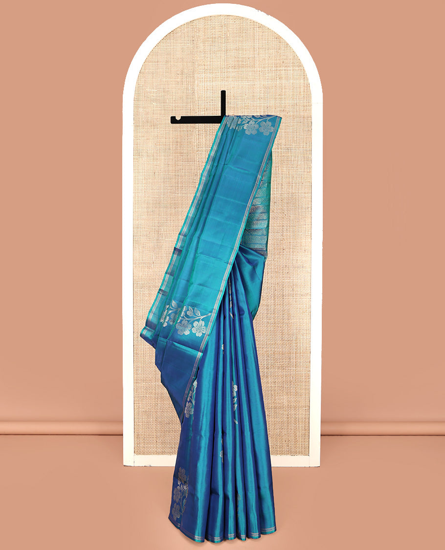 Borderless Blue Mayuri Lite Silk Mix Saree, Subtly Accented with Floral Zari Buttas All Over Its Body, Highlighted by a Pallu of Geometric Designs, and Paired with a Matching Blouse