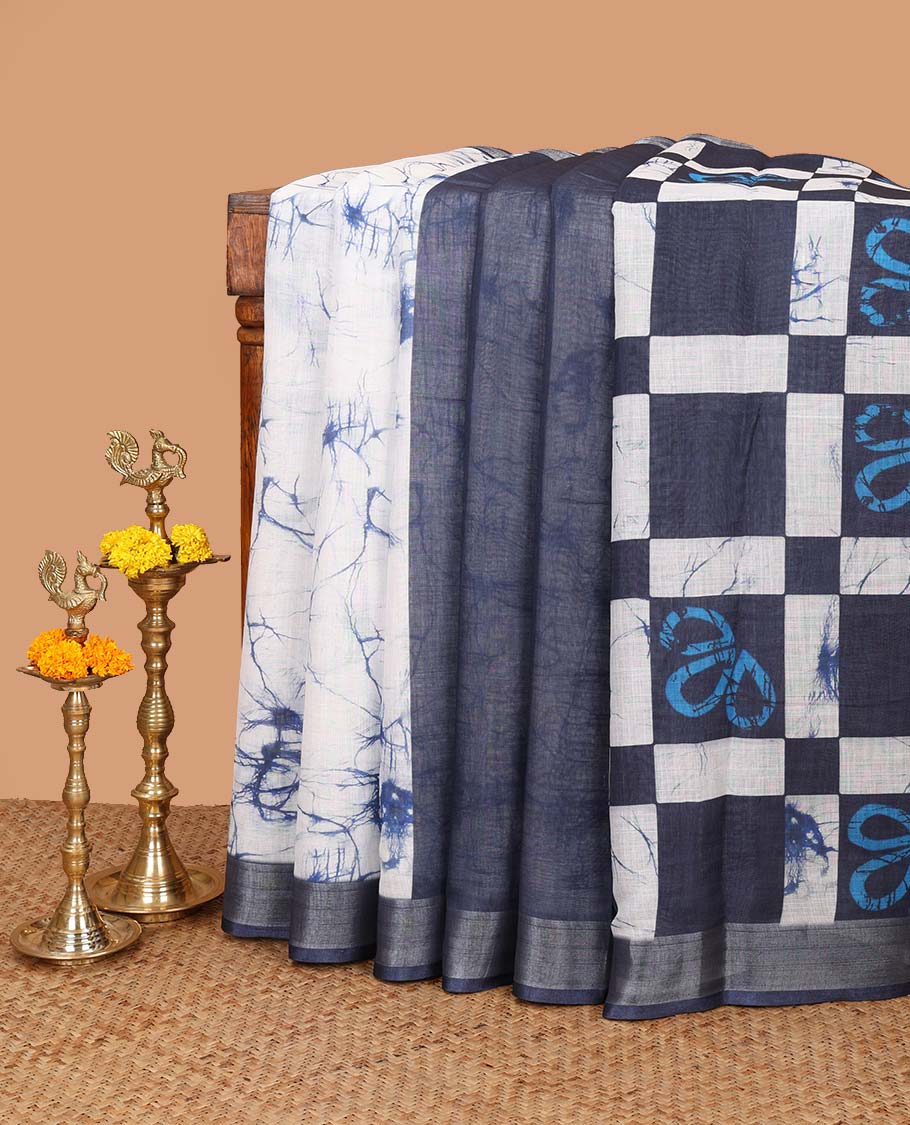 Indigo blue with white floral printed linen saree with zari bawanchi border & checked printed pallu along with plain blouse