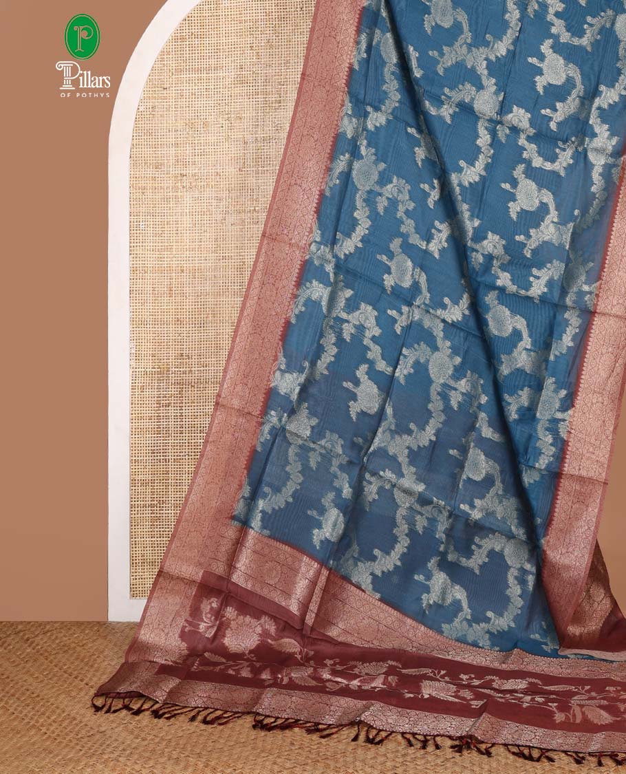 Blue jaal zari weaving banaras brasso saree with contrast jacquard border & rich weaving pallu along with butta design blouse